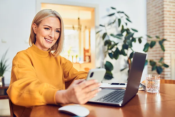 happy woman calling electrician